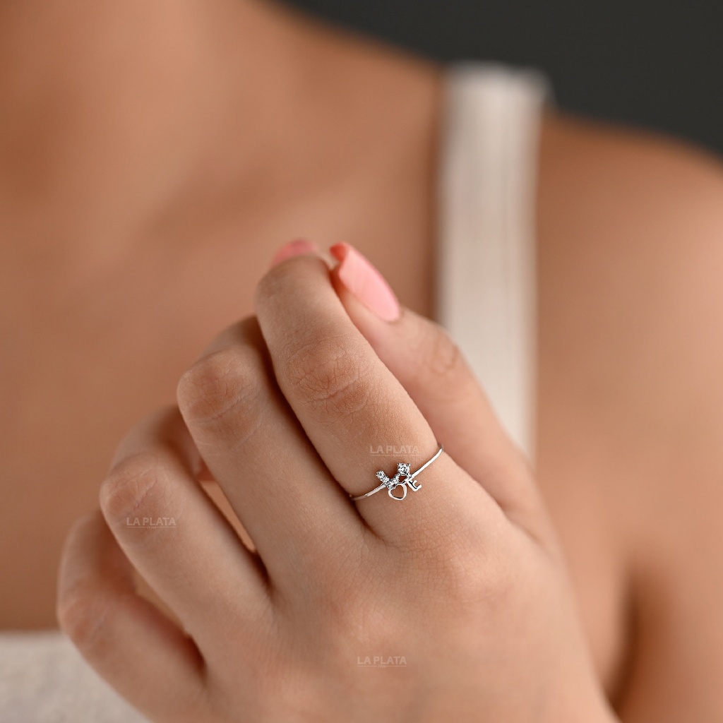 ANILLO LO-VE CON CIRCON ORO BLANCO