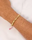 15 10 PULSERA MUCHOS BALINES HILO ROJO.webp