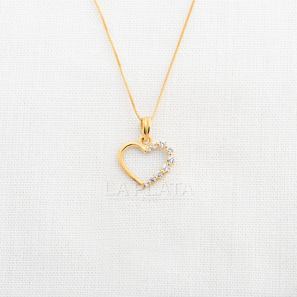 DIJE CORAZON CIRCONADO A MEDIO LADO