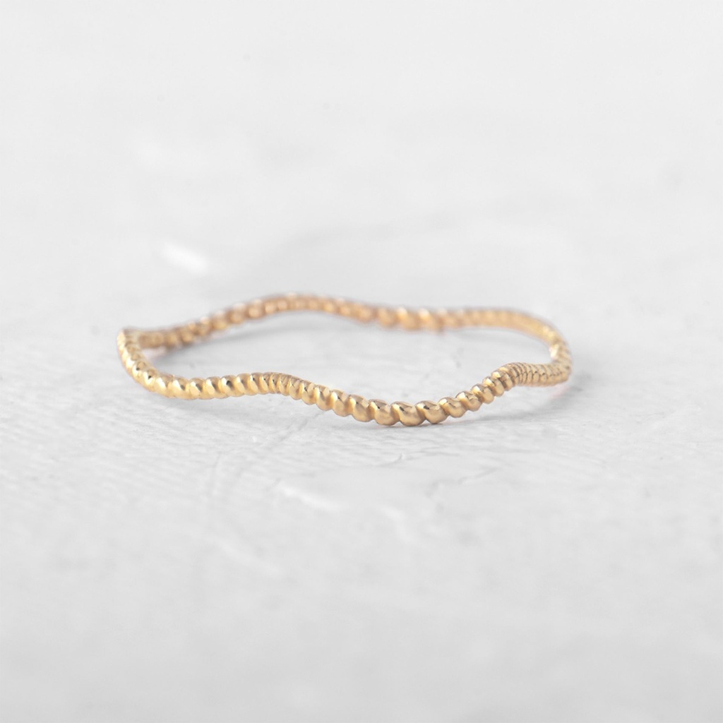 ANILLO OLAS CON GRAVADO